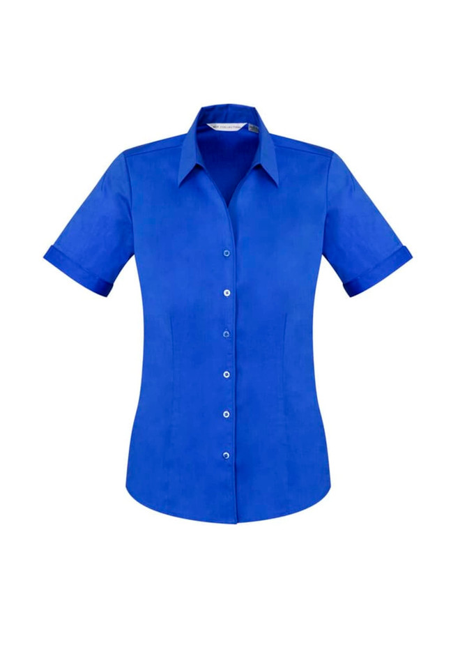 A blue short sleeve button-up shirt with a collar and branding on the design.