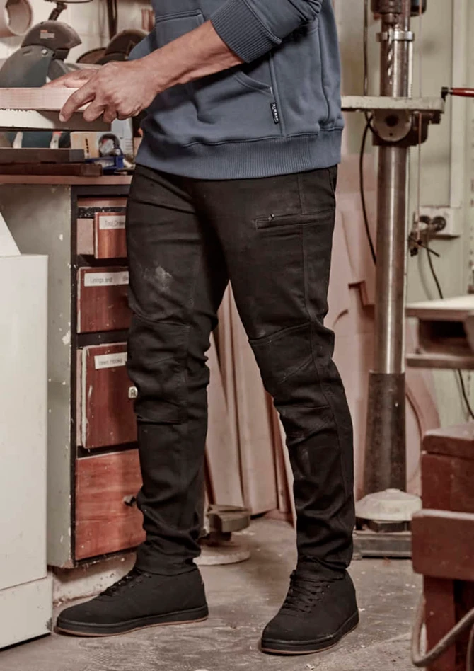 Mens Streetworx Stretch Jean in black, featuring a slim fit design, worn with a blue sweatshirt and black shoes.
