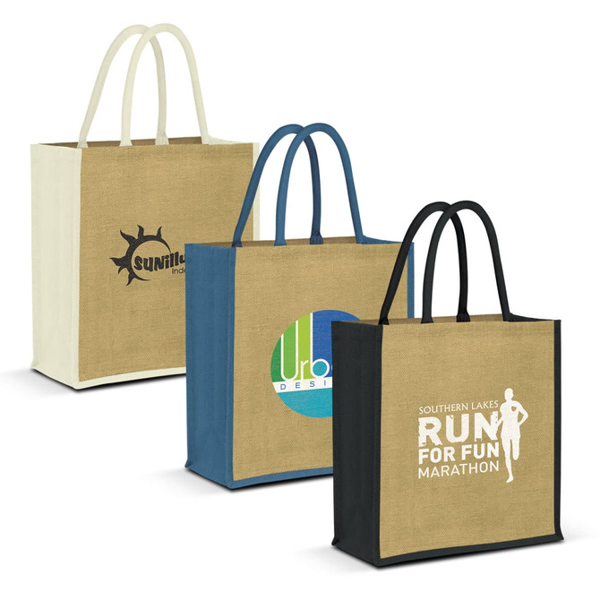 Three jute tote bags in beige, blue, and black with handles, each featuring different logos and designs.