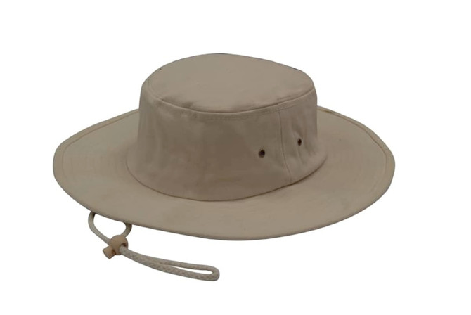 A beige brushed heavy cotton hat with ventilation holes and a chin strap. It has a round crown and wide brim.