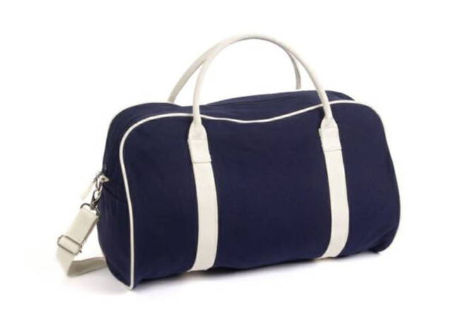 A navy bag with white accents and straps, featuring a shoulder strap and a logo.