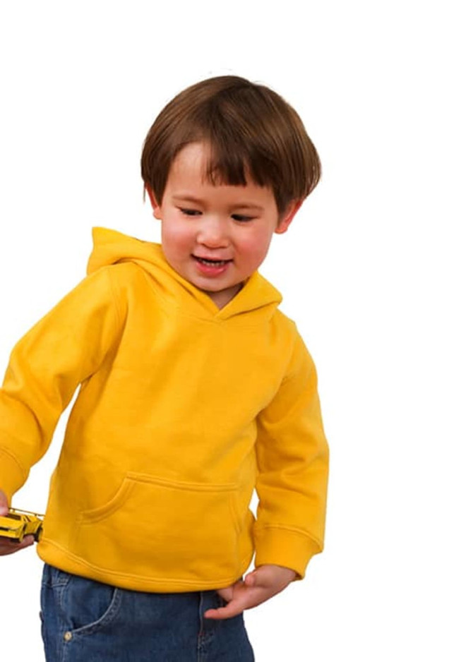 A yellow baby fleece hoodie with a front pocket, worn by a child playing with a toy car.