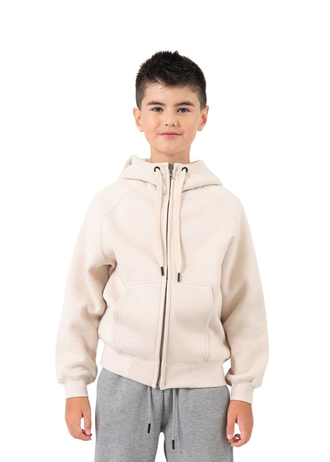 A cream cotton hoodie featuring a kangaroo pocket and zip closure, modelled by a boy.