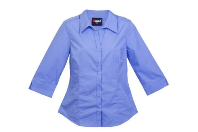 A light blue women's 3/4 sleeve button-up shirt with a collar and branding detail.