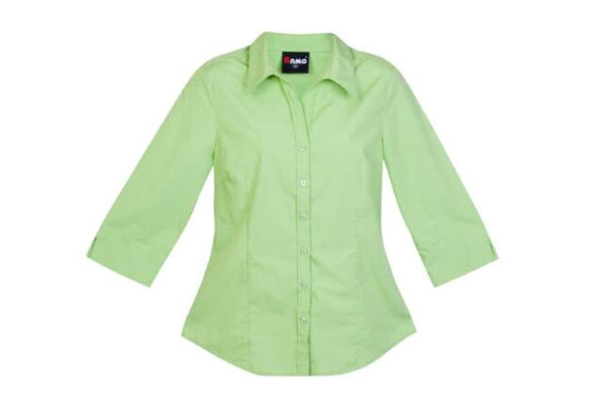 A light green women's 3/4 sleeve button-up shirt with a collar and branding.