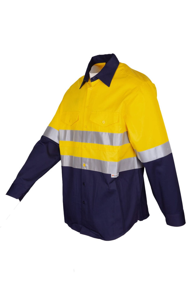 A long sleeve shirt in yellow and navy with reflective stripes and a logo on the chest pocket.