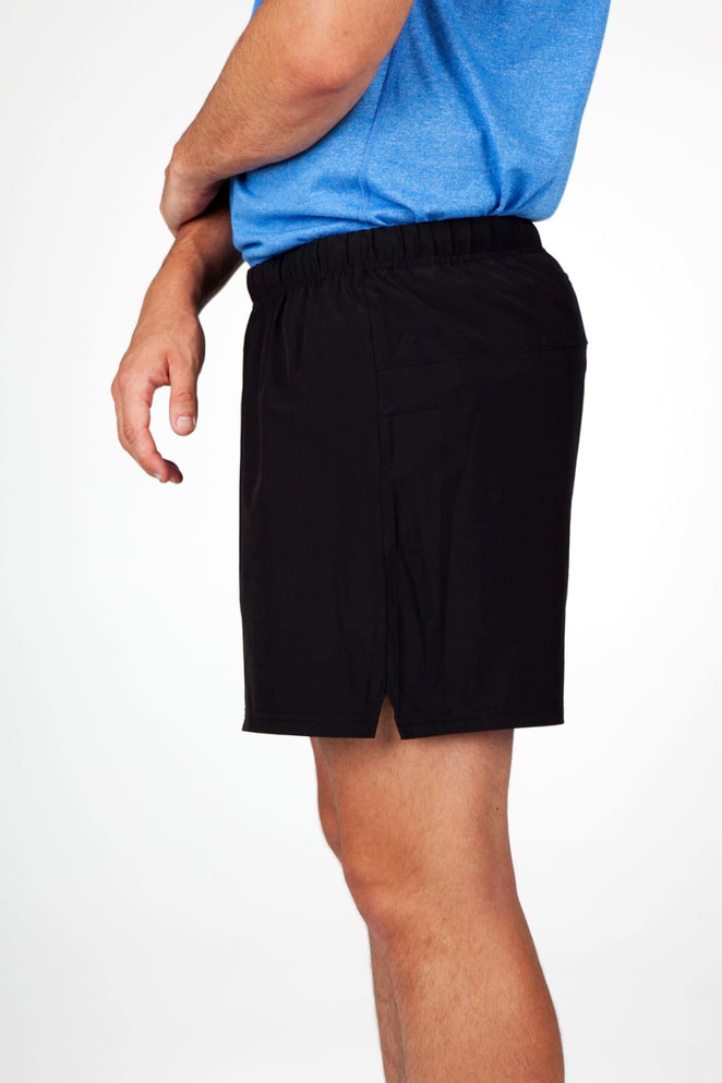 Men's FLEX shorts in black with a 4-way stretch design and an elastic waistband. Features a logo on the side.