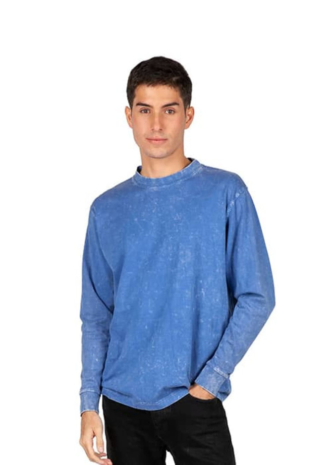 A blue stone wash long sleeve t-shirt on a model, featuring a casual fit and a logo.