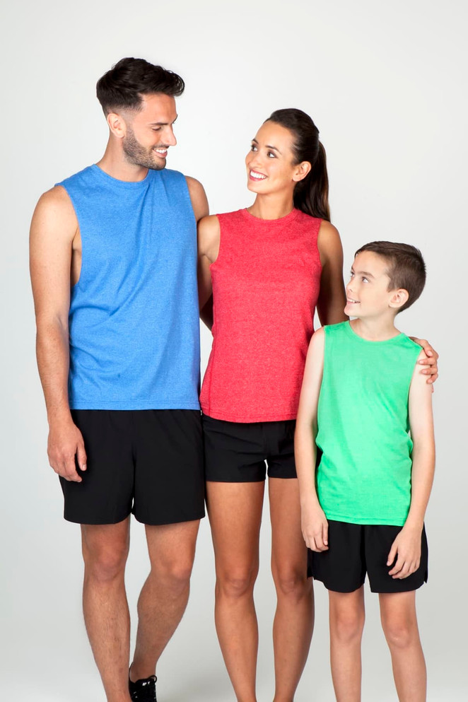 A family wearing tank tops in blue, red, and green, with black shorts, posing together against a light background.