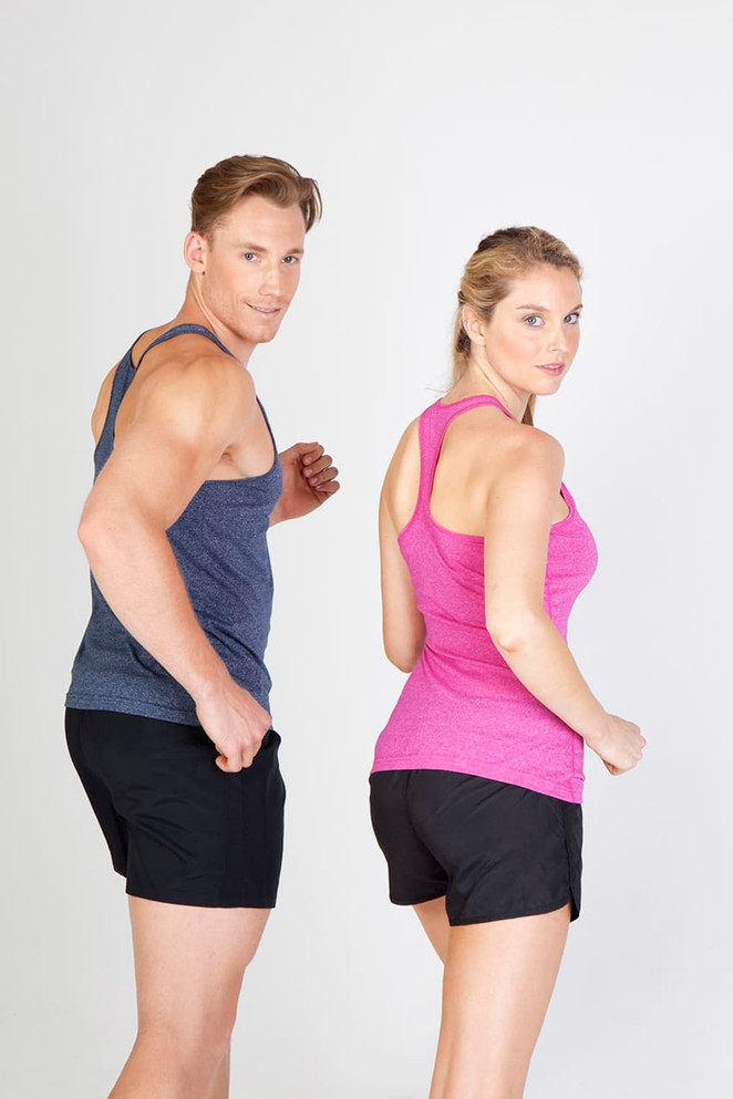 A man in a blue athletic singlet and a woman in a pink athletic singlet, both wearing black shorts, pose back-to-back.