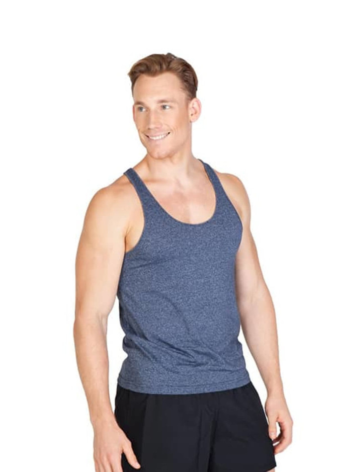 A man wearing a navy blue athletic T-back singlet with a logo, standing and smiling.