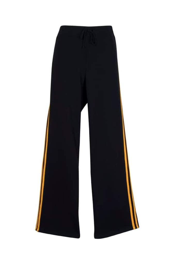 Black track pants with yellow stripes down the sides, featuring a drawstring waistband and a relaxed fit.