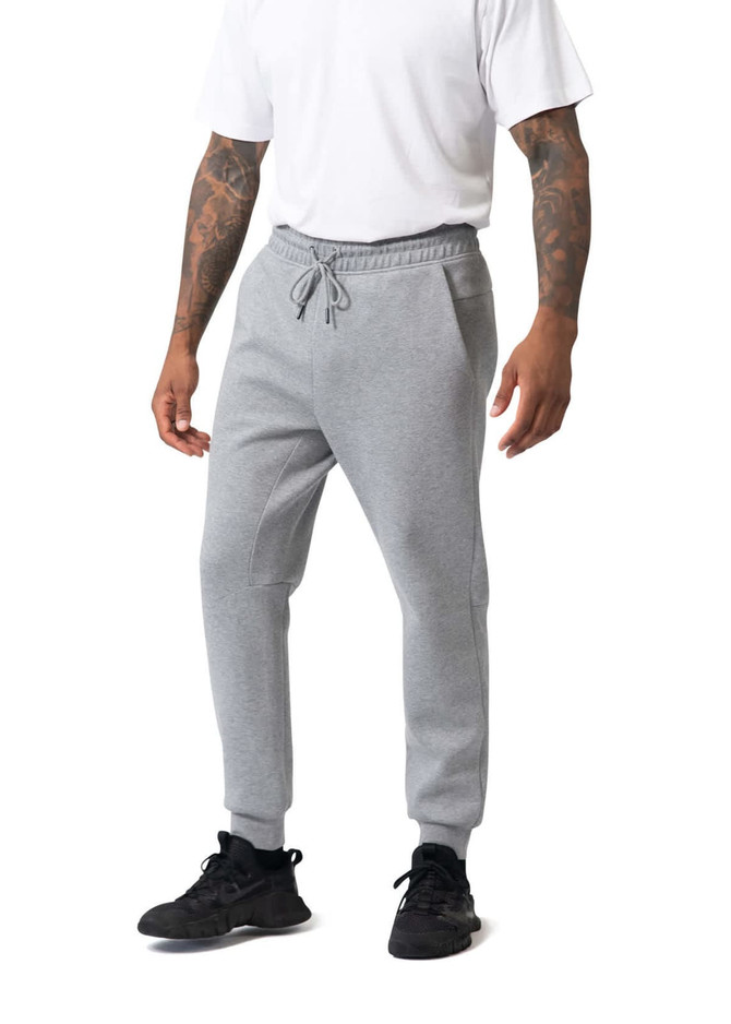 Men's three-layer cotton sandwich pants in grey, featuring a drawstring waist and tapered cuffs. Includes a logo.