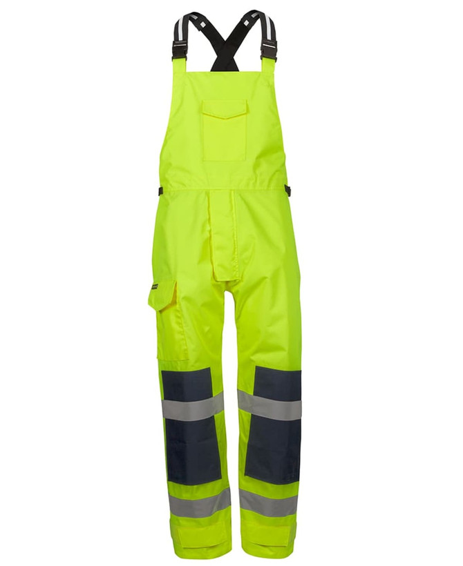 Bright yellow waterproof bib and brace with reflective strips and dark navy details. Features adjustable straps and pockets.