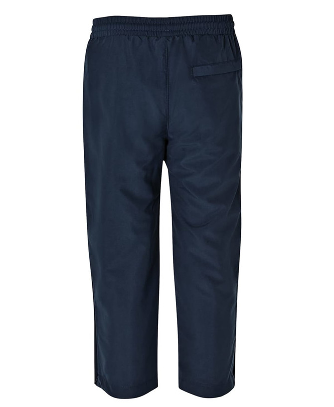 Track pants in navy blue with an elastic waistband and a back pocket. Features a logo on the fabric.