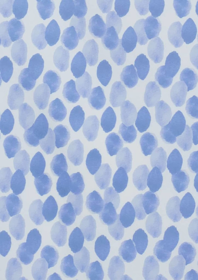 A blue and white tunic featuring a stardust print with abstract spot patterns. The design has a soft, watercolour effect.