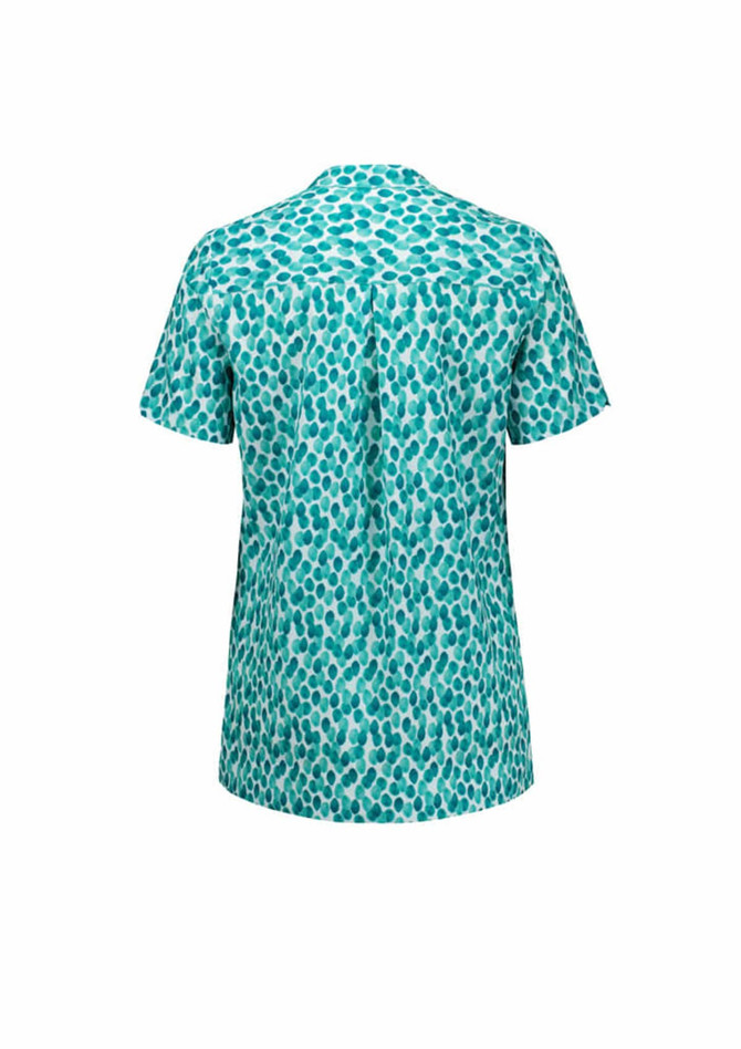 A turquoise tunic with a stardust print, featuring a simple back design and short sleeves. It has a logo.