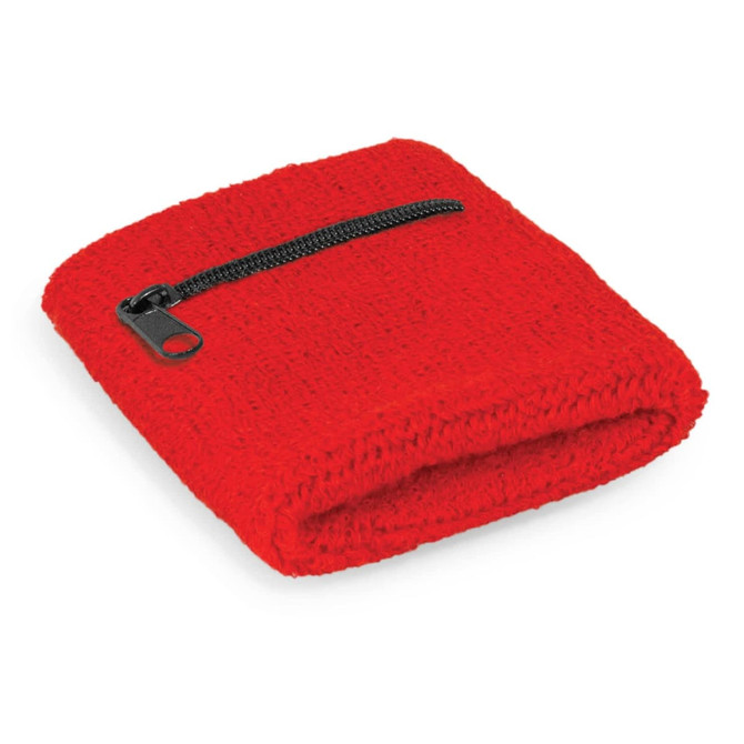 A red wrist sweat band with a zippered pocket for small items. It has a textured knit design and includes a logo.