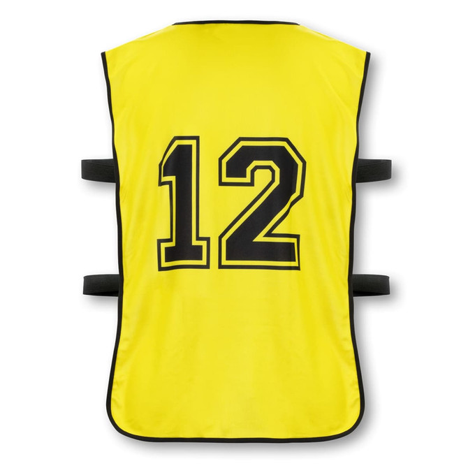 A bright yellow training bib featuring a large black number 12 and adjustable black straps on the sides.