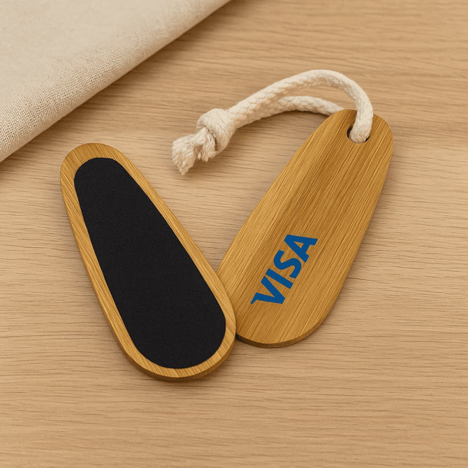 A bamboo paddle nail file set with a natural wood finish and black accents, featuring a rope handle and a logo.
