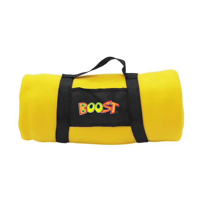 A rolled yellow blanket with a black strap and a logo. The blanket is vibrant and plush.