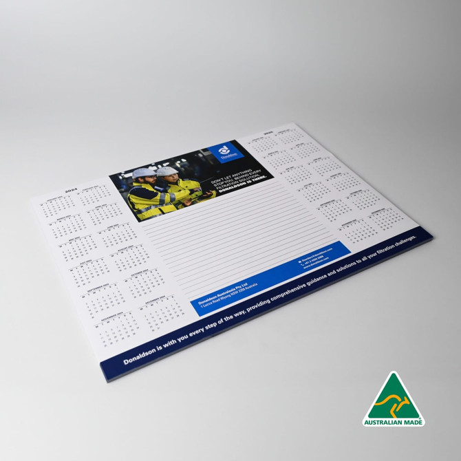 A3 notepad featuring a white background with a calendar layout and a space for notes. Includes a logo.