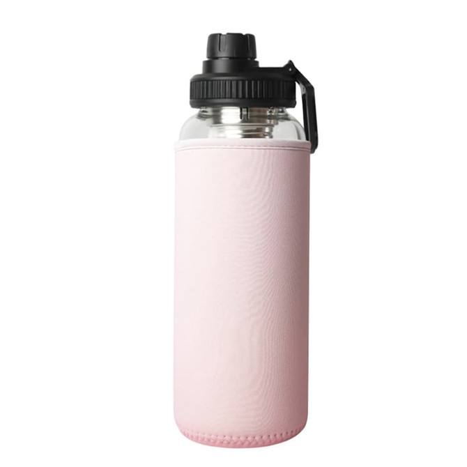 A drink bottle with a transparent glass body and a pink silicone sleeve, featuring a black screw-top lid and handle.