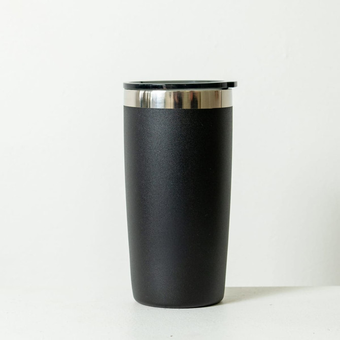 A drink bottle in matte black with a silver rim and a black lid. It features a branding logo.
