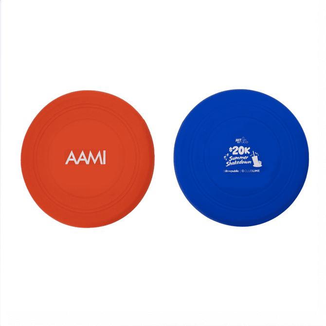 A red and blue silicone frisbee featuring a logo on one side, designed for fun and games.