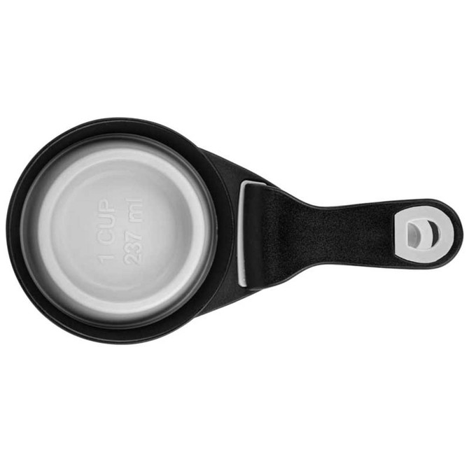 A collapsible silicone pet food scoop in black, featuring a metallic measuring cup and a handle with a loop for easy storage. A collapsible silicone pet food scoop in black, featuring a metallic measuring cup and a handle with a loop for easy storage.