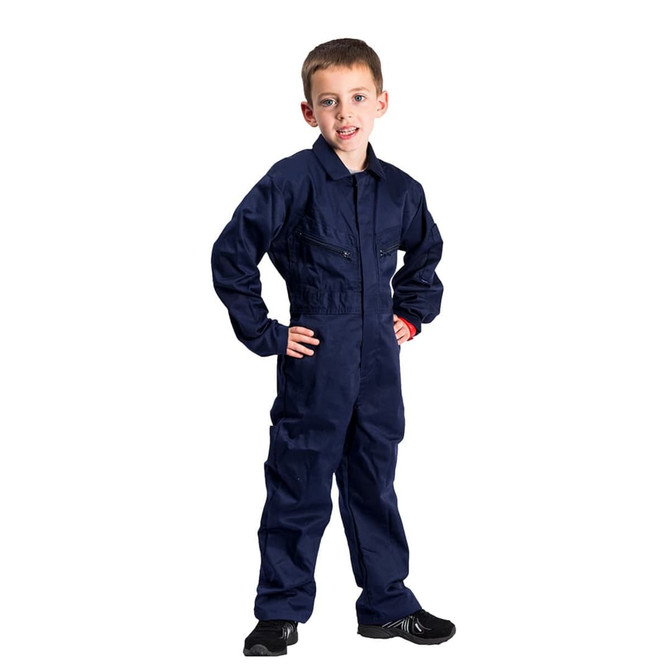 A youth in a navy blue coverall with a zip front and multiple pockets, featuring a logo on the chest.