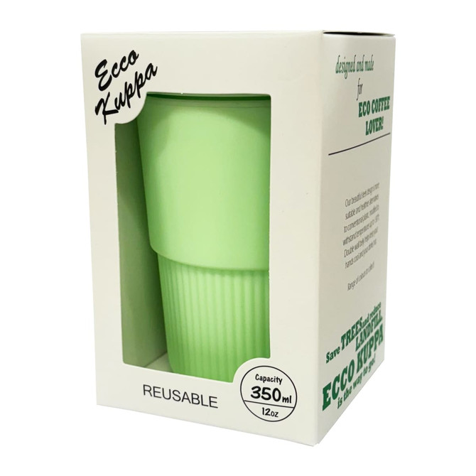 A reusable coffee cup in light green, featuring a ribbed design and packaged in a white box. It has a branding logo.