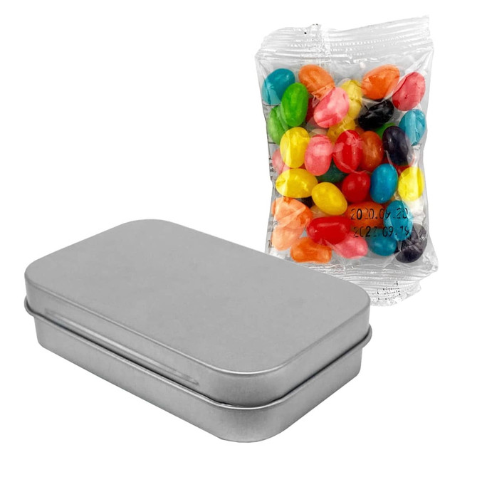 A tin container with a silver finish beside a transparent bag of colourful jelly beans.