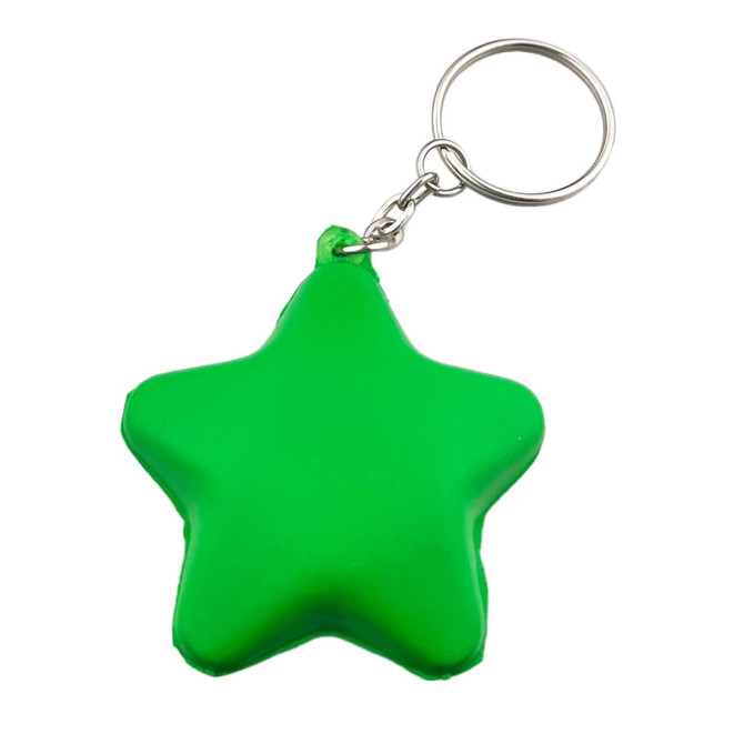 A green star-shaped stress key ring with a silver keychain. It features a smooth, glossy finish. A green star-shaped stress key ring with a silver keychain. It features a smooth, glossy finish.