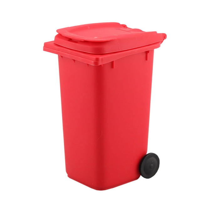 A red wheelie bin pen holder with a lid and a black wheel, suitable for office use.