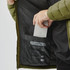 A green men's thermal jacket with an inner pocket, featuring a hand placing a phone inside.