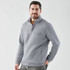 A grey thermal 1/4 zip pullover for men, featuring a pocket and a logo.