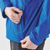 A blue men's rain jacket with a 1/4 zip design, featuring a logo and close-up of the zipper being adjusted.
