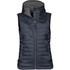 A navy women's thermal vest with a zip front, hood, and multiple zippered pockets. It features a logo on the side.