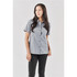 A short-sleeved, button-up shirt in grey, modelled by a woman, featuring a logo on the chest area.