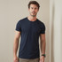 A navy blue men's active sports T-shirt with a round neckline and short sleeves, featuring a logo on the chest.
