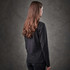 A black long-sleeve henley shirt for women, displayed from the back, with a simple design and a fitted silhouette.