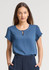 A blue short sleeve blouse with a keyhole detail at the neckline, featuring rolled cuffs.
