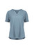 A short sleeve blouse in light blue, featuring a V-neck and a relaxed fit. It has a subtle ruché texture and a logo.