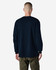 A person wearing a heavyweight cotton unisex long sleeve t-shirt in navy, viewed from the back. The shirt has a logo.