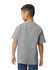 A youth midweight T-shirt in grey, featuring short sleeves and a relaxed fit. The model stands with hands in pockets.
