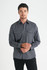 A grey long sleeve button-up shirt for men, featuring two chest pockets and a logo.