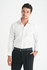 A men's long sleeve button-up shirt in white, featuring a sleek design and a logo on the chest.