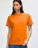 An orange heavyweight cotton unisex T-shirt displayed on a model with a neutral background.