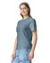 A casual heavyweight t-shirt in a soft blue colour, featuring short sleeves and a relaxed fit, displayed on a model.